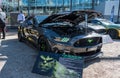 Black custom Mustang GT car at Motorclassica